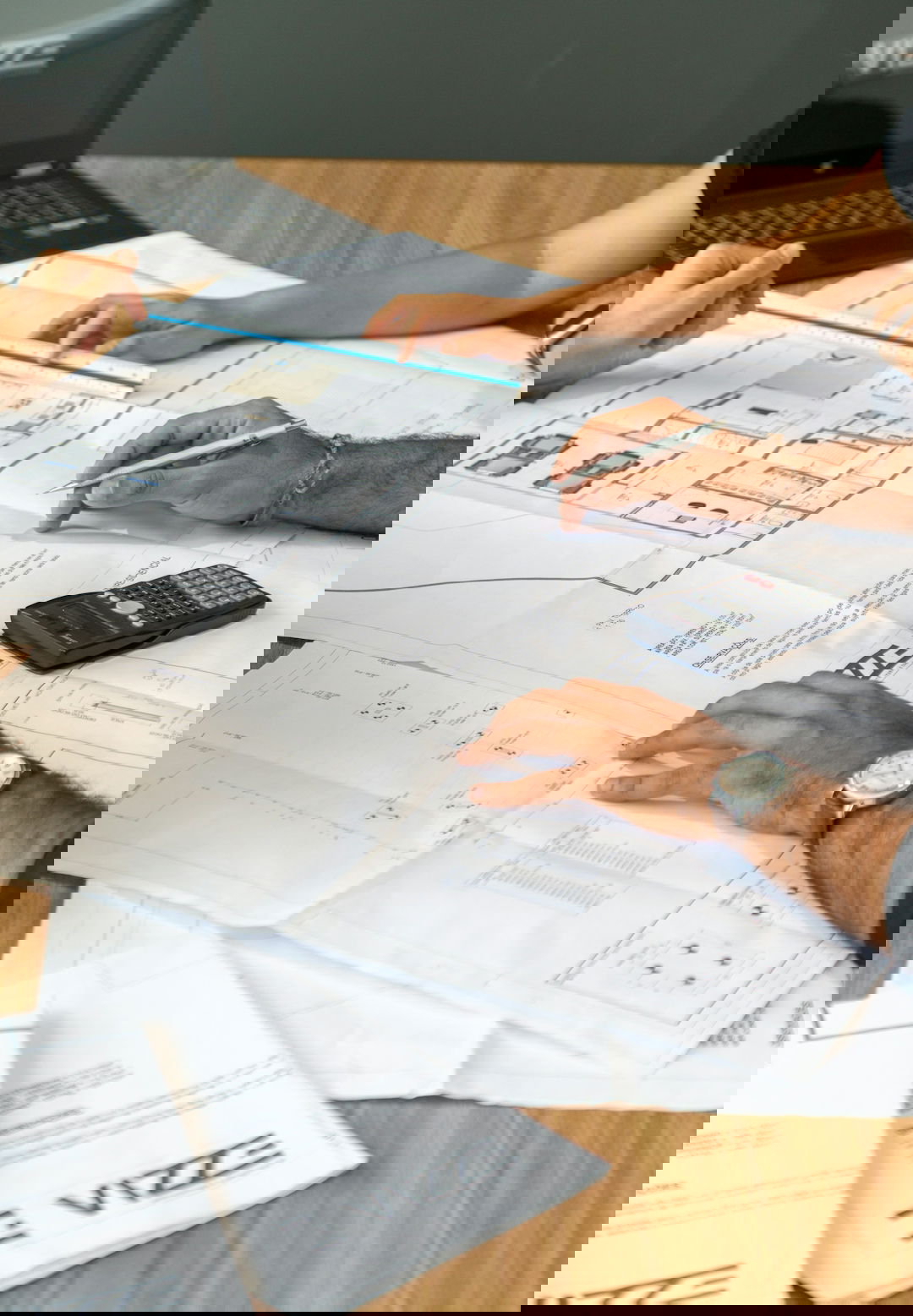 person writing on white paper