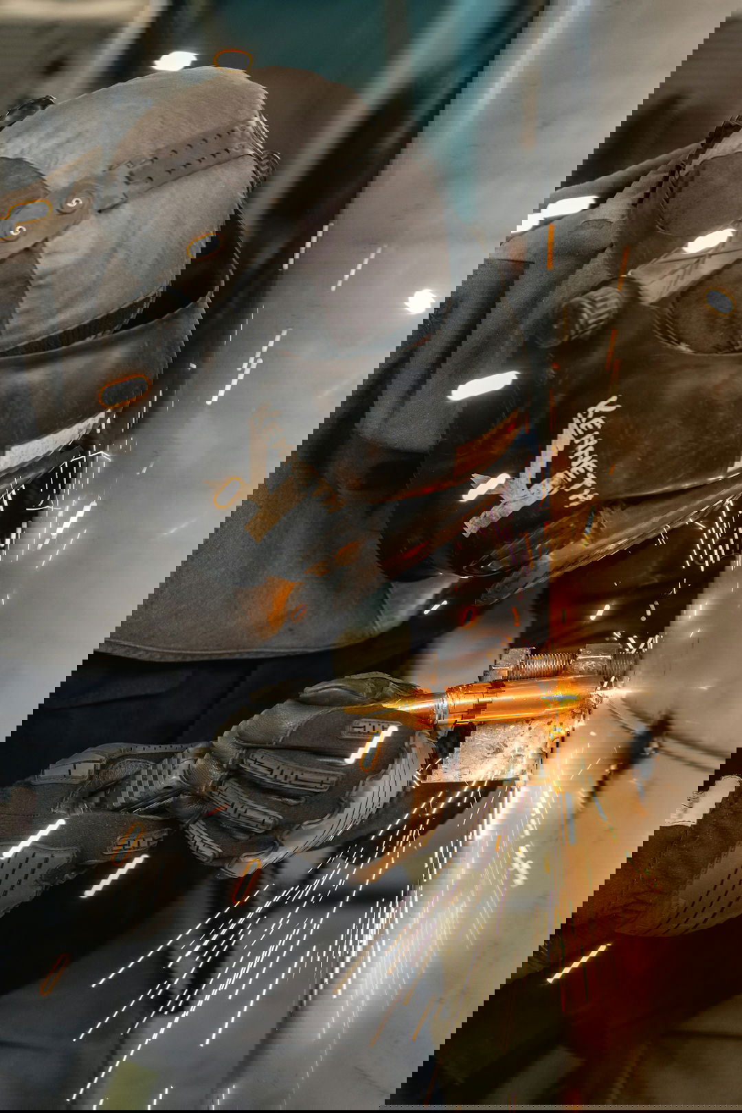 a person wearing a mask and holding a gun