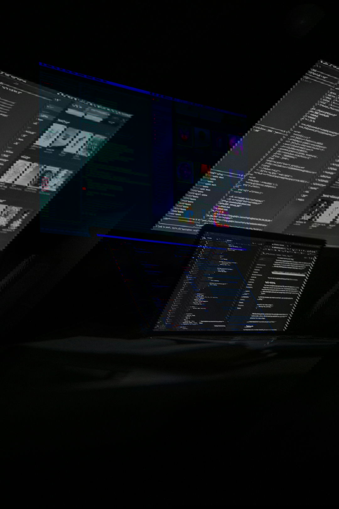 a laptop computer sitting on top of a desk